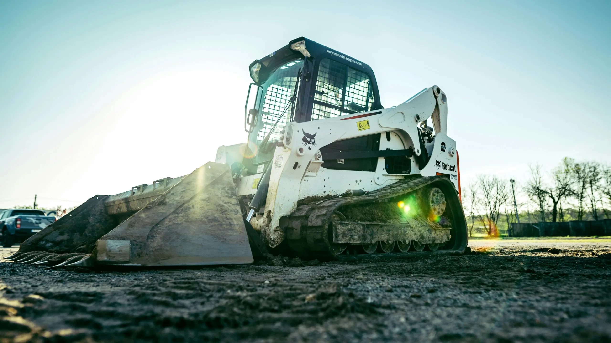 Skid steer leasing — operator loading dirt